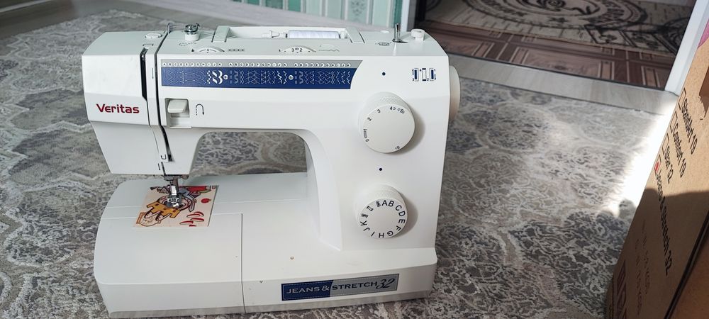 Швейная машина с педалью