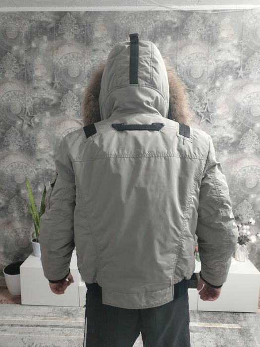 Продам оригинальный пуховик