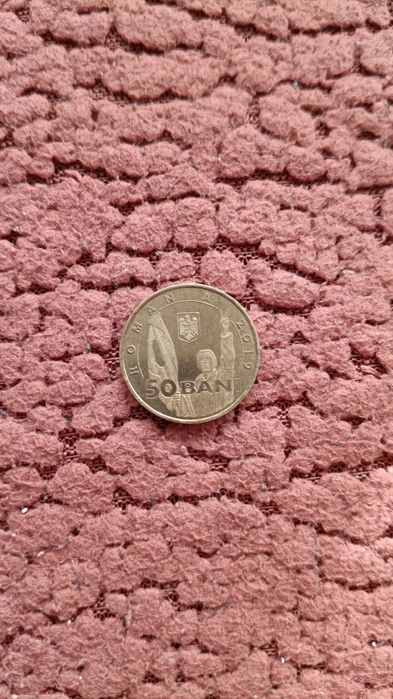 Moneda 50 de bani revoluție