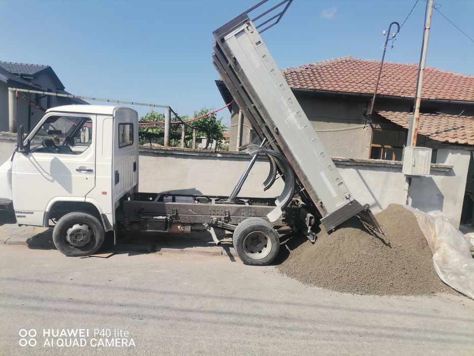 Самосвал Нисан Трейд