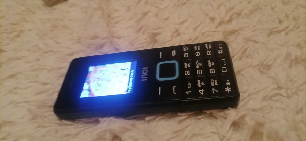 Сотовый телефон "Inoi"