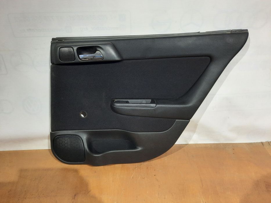 Обшивки дверей Опель Астра G