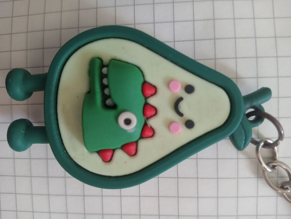 Брелок авакадо с роботом мишкой тоже брелок