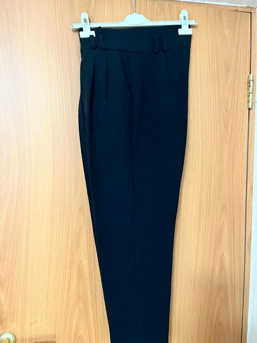 Женские брюки и брюки- Капри