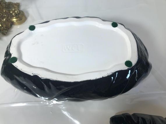 Керамечен съд под формата на дамска чанта