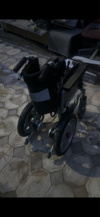 Электрическая инвалидная коляска