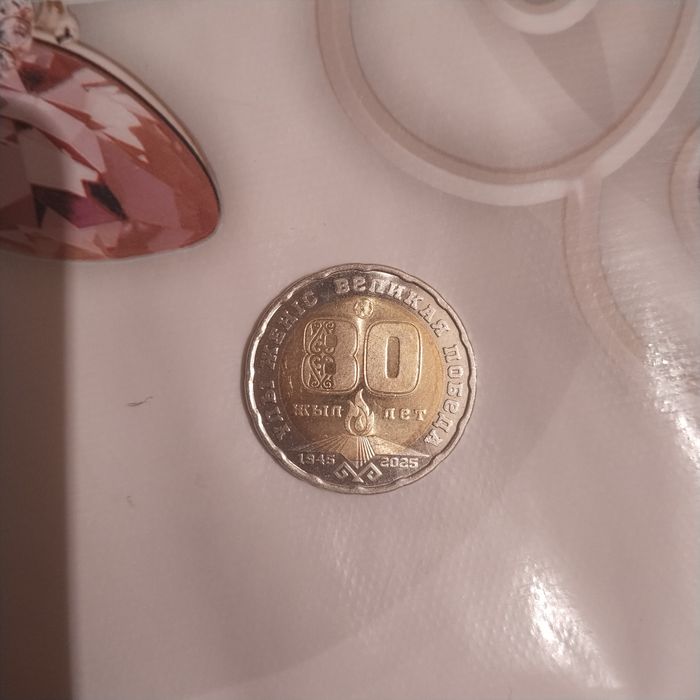 Продам монету с символом