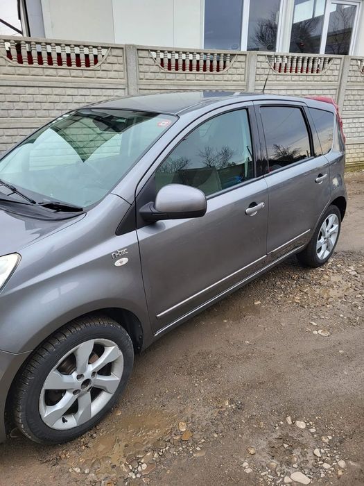 Dezmembram Nissan Note 2011 Aripa stanga/Capota/Usa stanga fata/ Usa dreapta spate