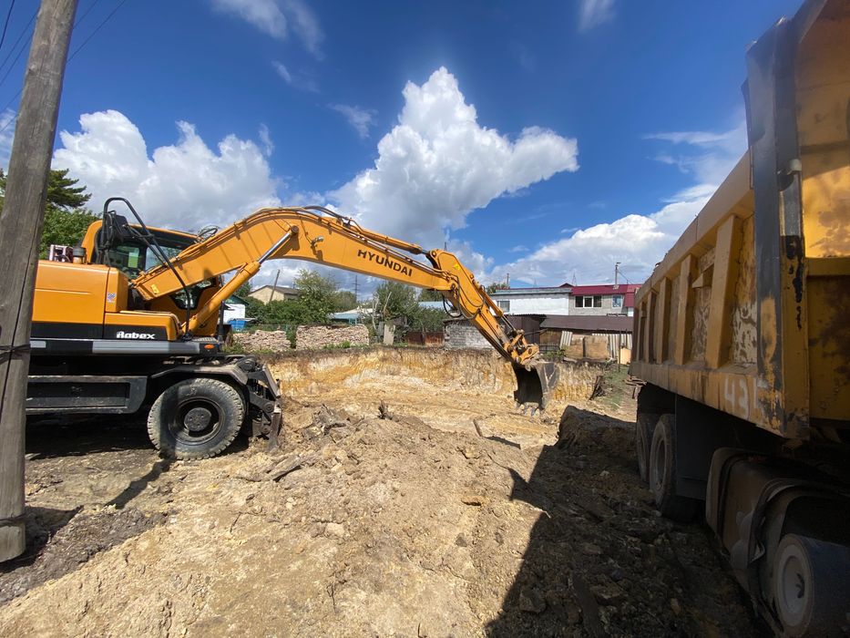 Услуги колесного экскаватора