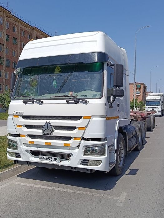 HOWO A6 + Контейнеровоз прицеп Сотилади