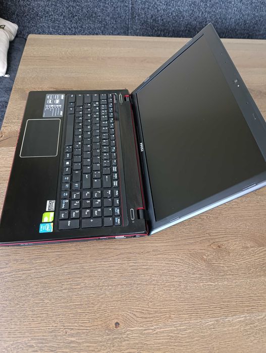 Геймърски MSI GE60 15.6" / Core i5 / 128GB SSD / 512GB HDD / 8GB RAM / NVIDIA GT 750M / Win 10 Pro