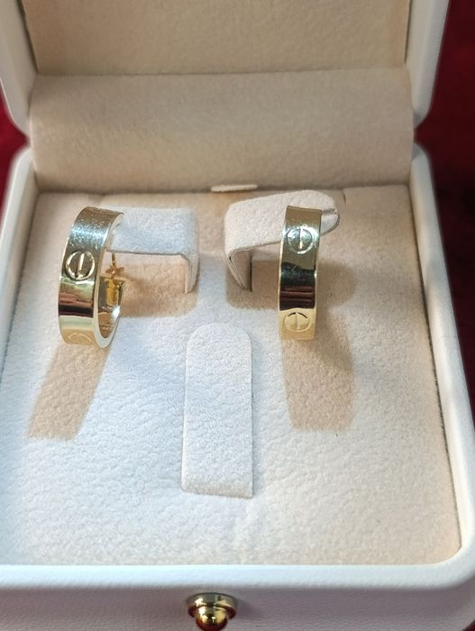 Золотые серьги CARTIER с кольцом, проба 585,вес 2,72,