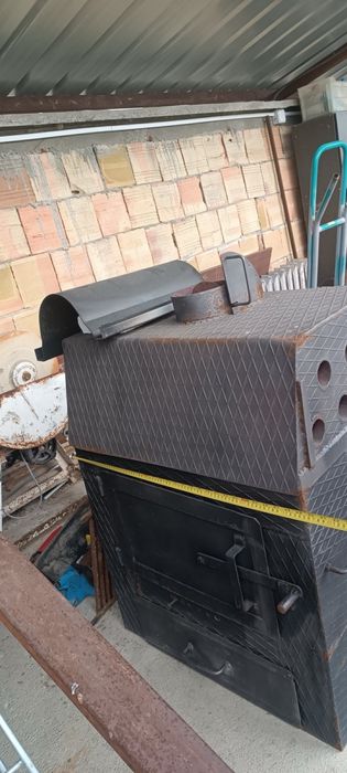 Отопляема печка на дърва и/или въглища