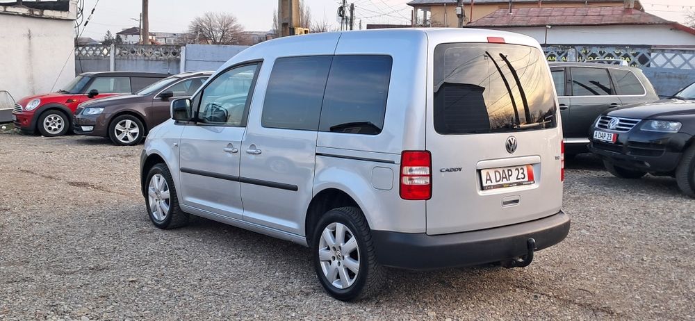 Volkswagen Caddy 1.2 BENZINĂ 105 CP 7 LOCURI 133000 KM an 11.2012