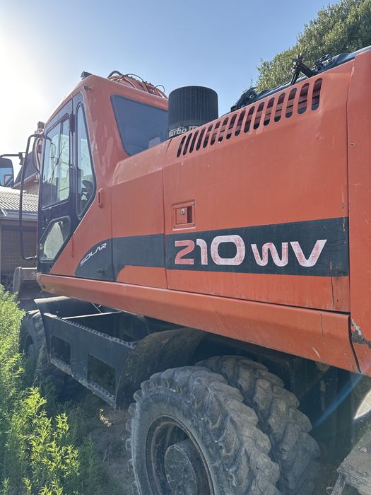 Dossan 210 экскаватор