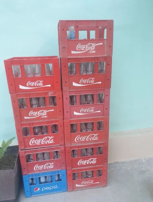 Ящик бутылкаси билан
