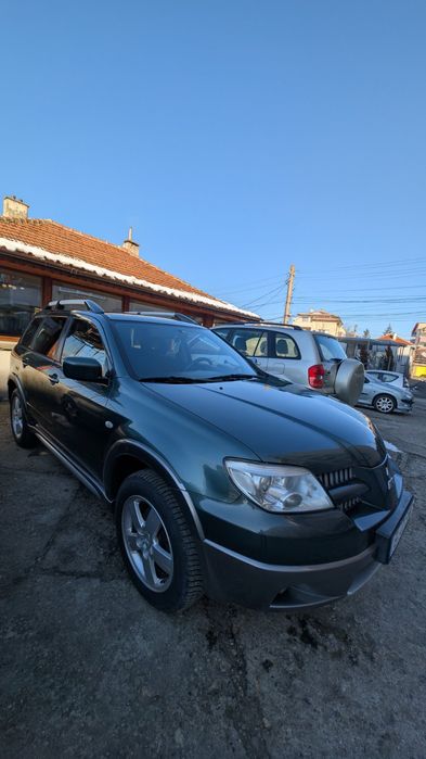 Mitsubishi Outlander 2.4 Газ / Бензин