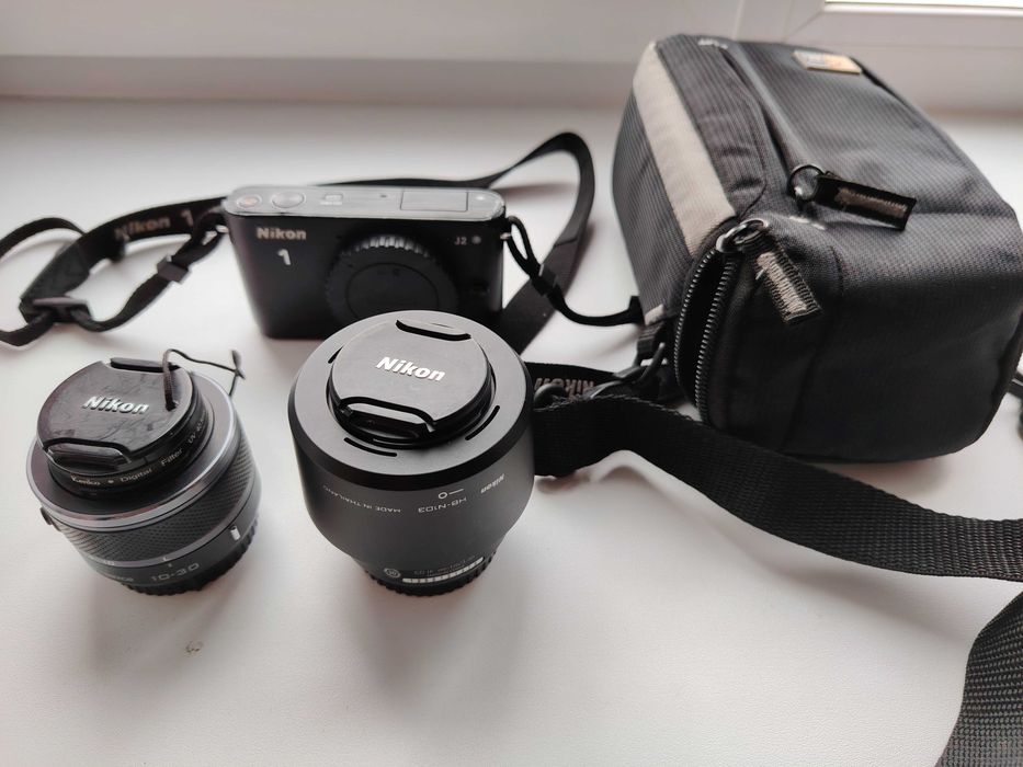 Nikon 1 j 2 с двумя объективами.