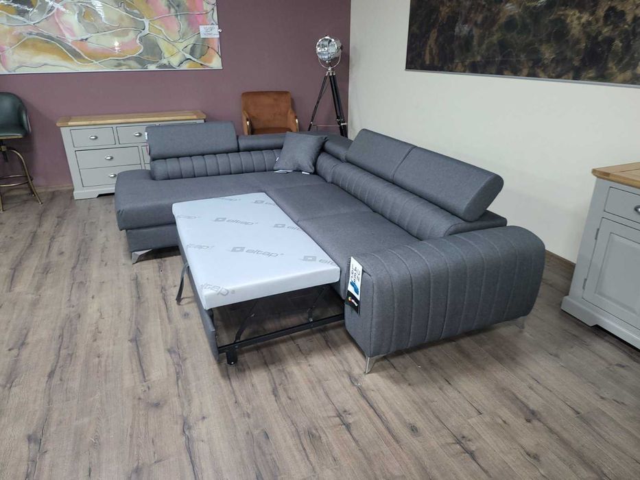 Сив ъглов диван от плат с функция сън и ракла