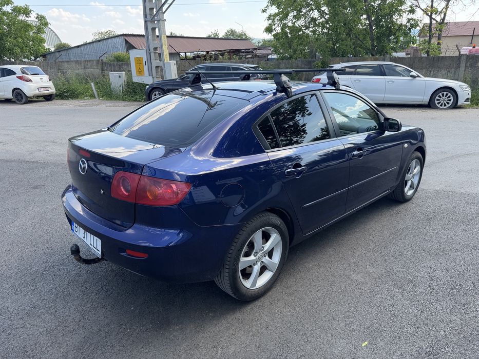 Mazda 3, Limuzină