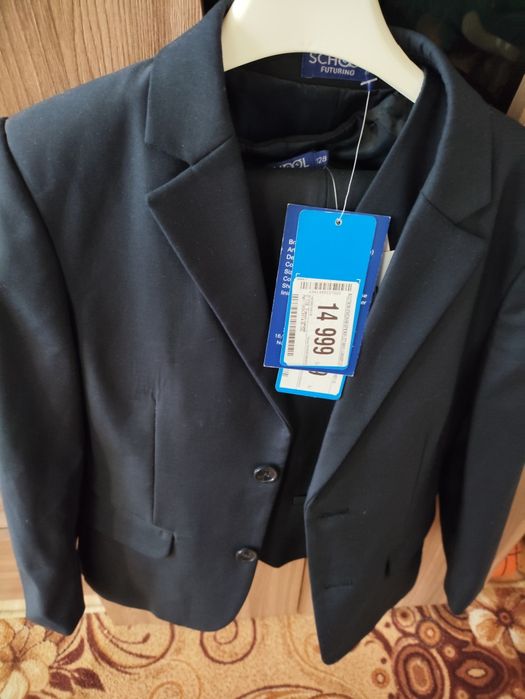 Продам новый костюм