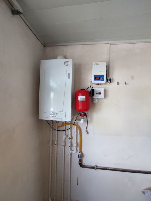 Установка двухконтурных котлов , радиаторов, теплый пол, коллекторов.