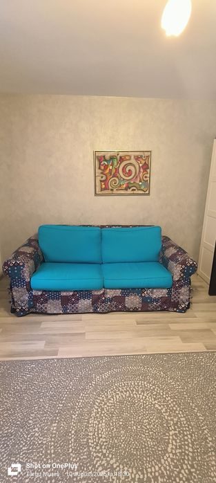 Canapea extensibila și fotoliu