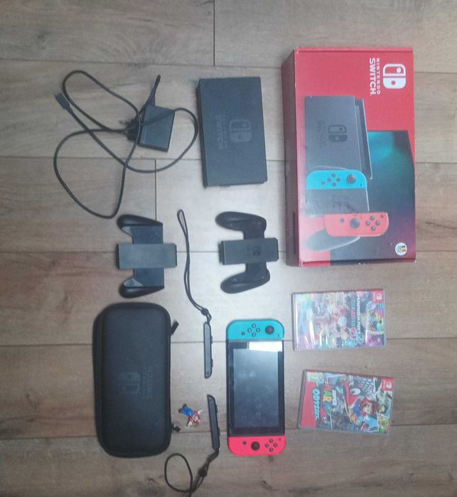 Pachet Nintendo Switch V2 (Neon Red/Blue) + 2 Jocuri + Accesorii & Cutie