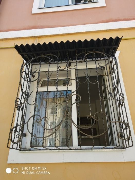 Металлические решетки и двери