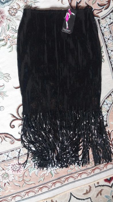 Юпка қара жылтырақ