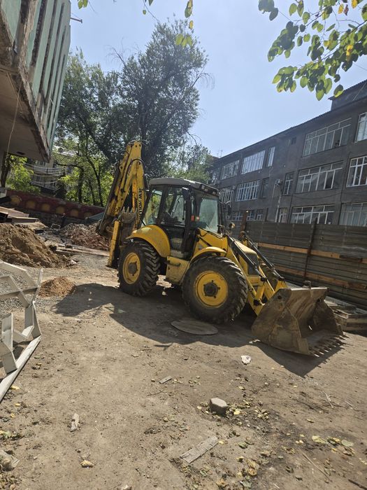 Услуги экскаватора погрузчика гидромолот