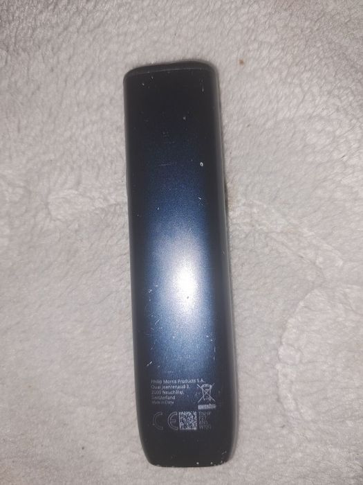 Un iqos și doua cuti cu filtre cu arome