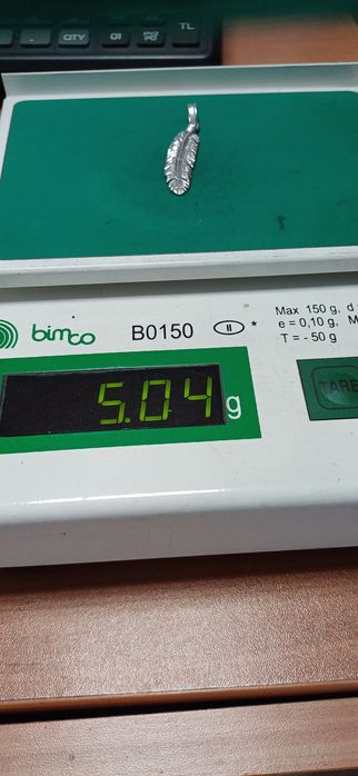 Сребърно авторско перо.