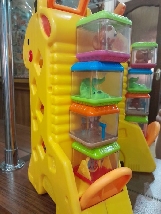 Продам игрушку жирафика