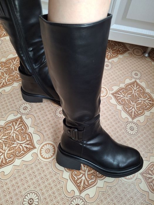 Продам новые сапоги