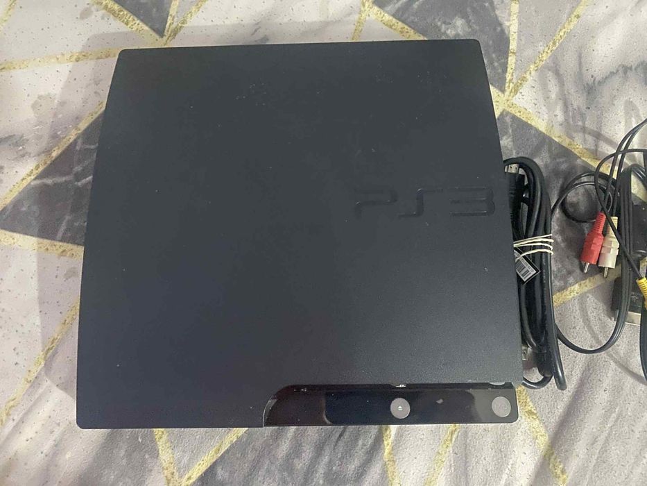 PlayStation 3 Slim + 2 manete + 21 jocuri – pachet complet
