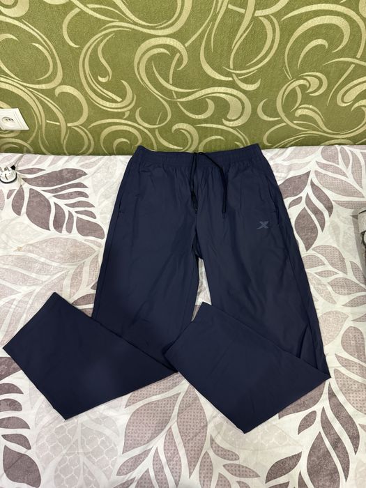 Спортивные оригинальные штаны Xtep