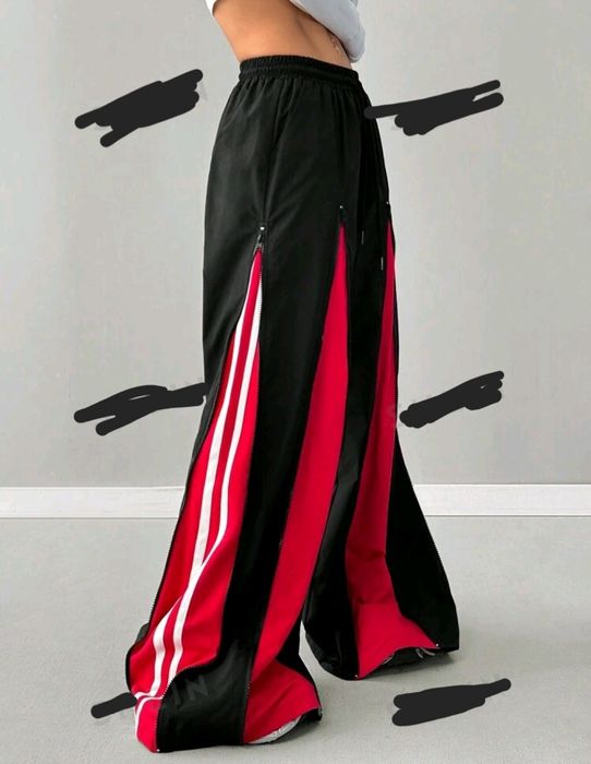 Pantaloni cu fermoar