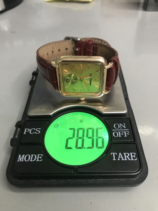 Мактайм часы золотые