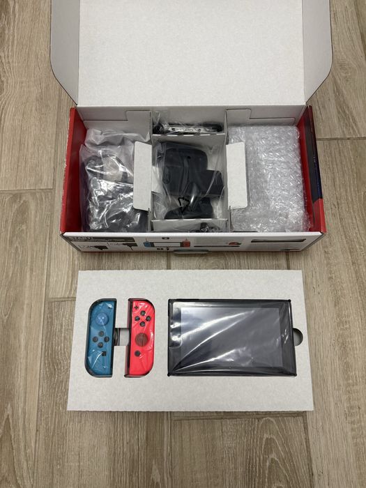 Pachet Nintendo Switch + Ring Fit + Pro Controller + 7 Jocuri (CA NOU)