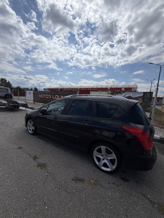 Vand peugeot 308 sw 7 locuri