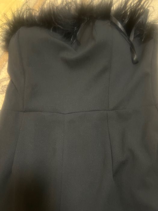 Черен гащеризон с пера