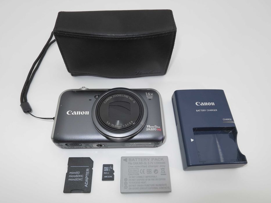 Canon PowerShot SX220 HS ултра компактен цифров фотоапарат с 14x Оптичен Зум, дигитална камера с Full HD в чудесно състояние, работи отлично