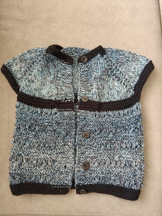 Плетени бебешки дрехи