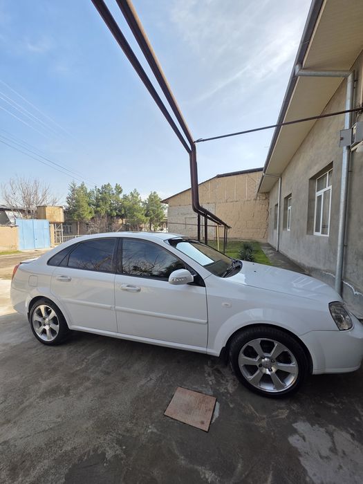 Lasetti,  Ласетти 1.8 автомат 2009 газ-бензин