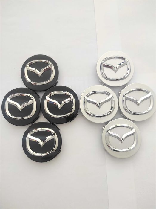 Капачки за Джанти за МАЗДА 56 мм. Цвят: Сребристи, червени и черни.