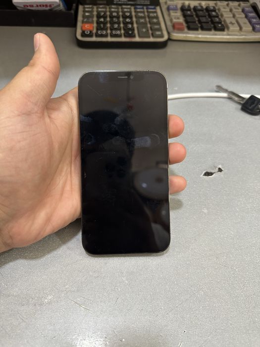 Iphone 12 pro holat idyal  arqa krshkan uzalmashkan
