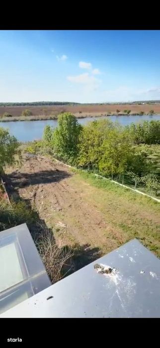 Teren intravilan 2.300 mp cu deschidere la lac, Ciofliceni