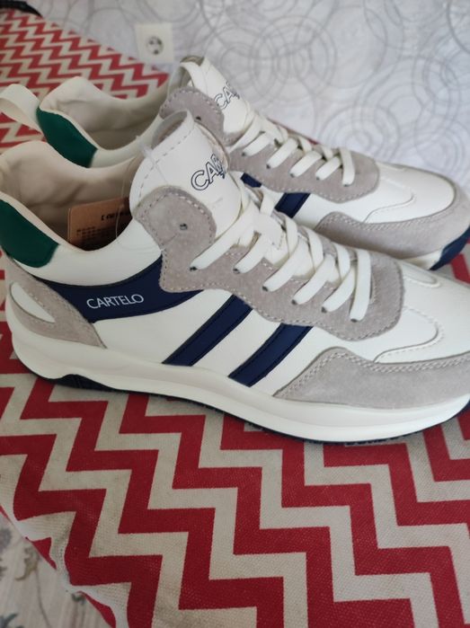 Кроссовки кожаные.