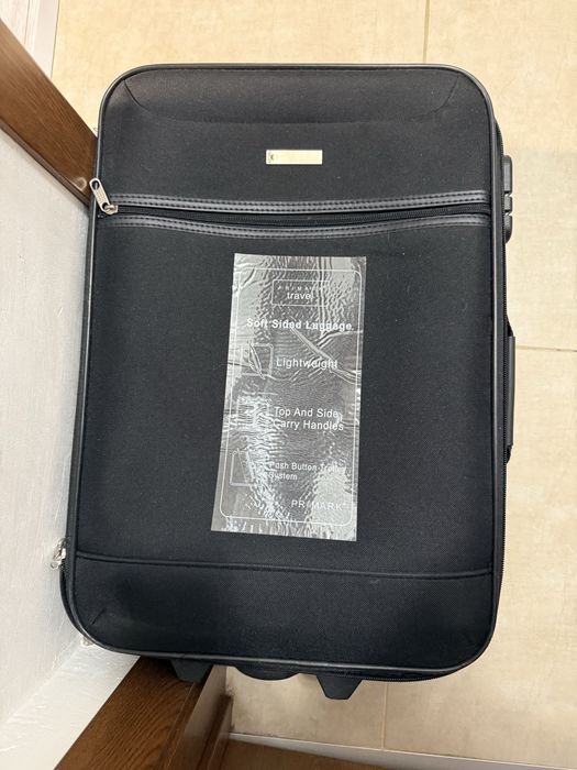 Куфар от Primark, нов, за 10 кг.